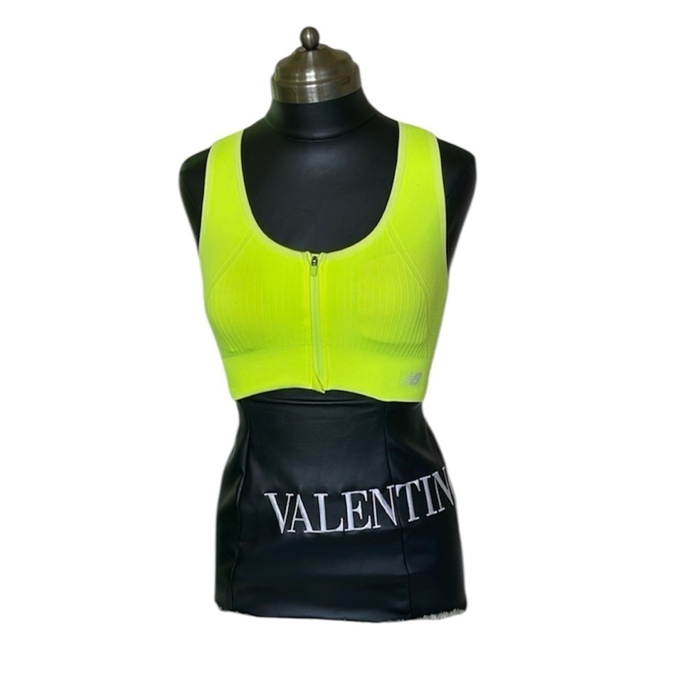 Neon green NB sports bra with zip in the front I honestly tried it on and washed